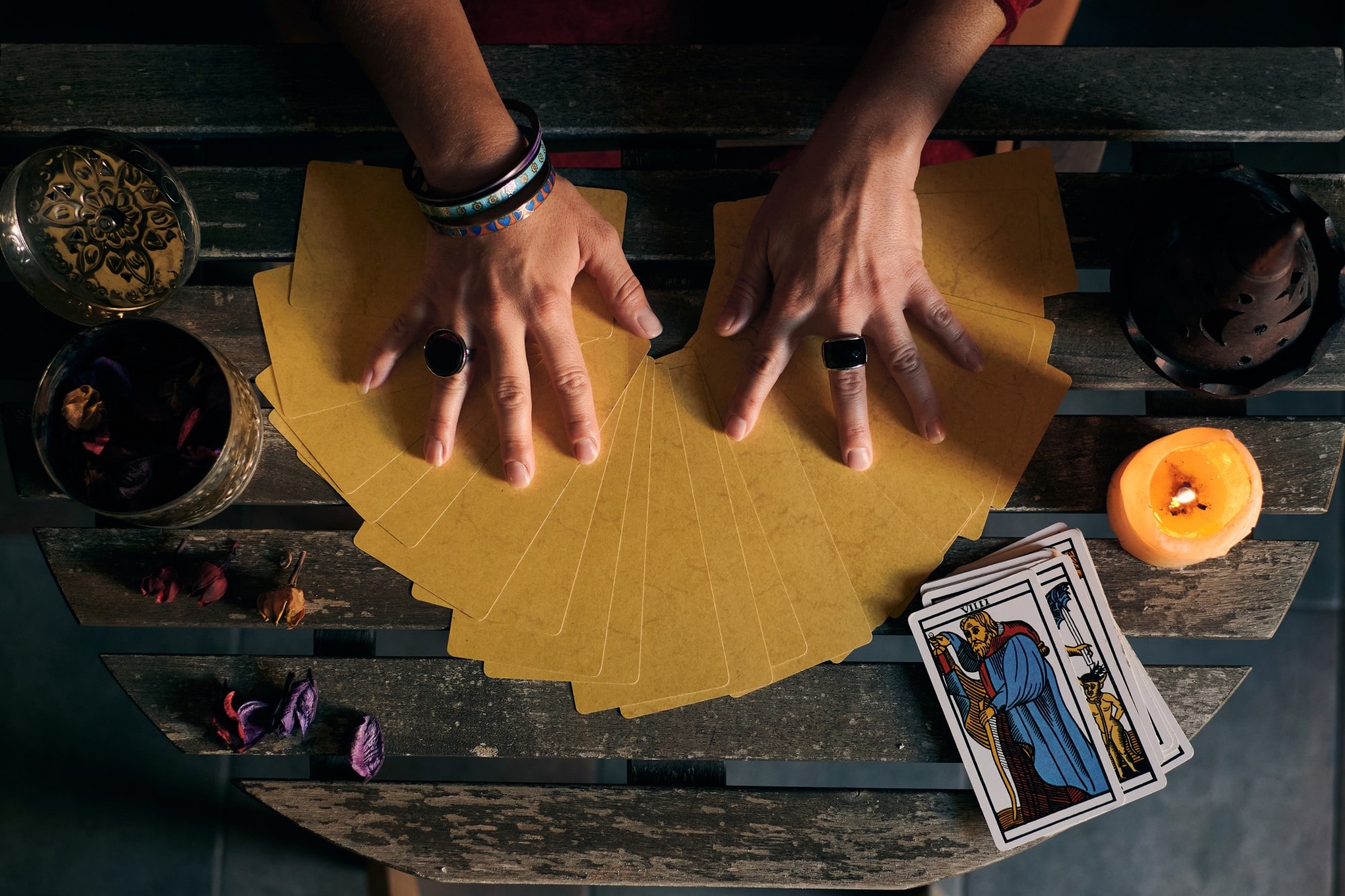 close up of a fortune teller displaying some tarot 2022 03 29 23 41 58 utc min