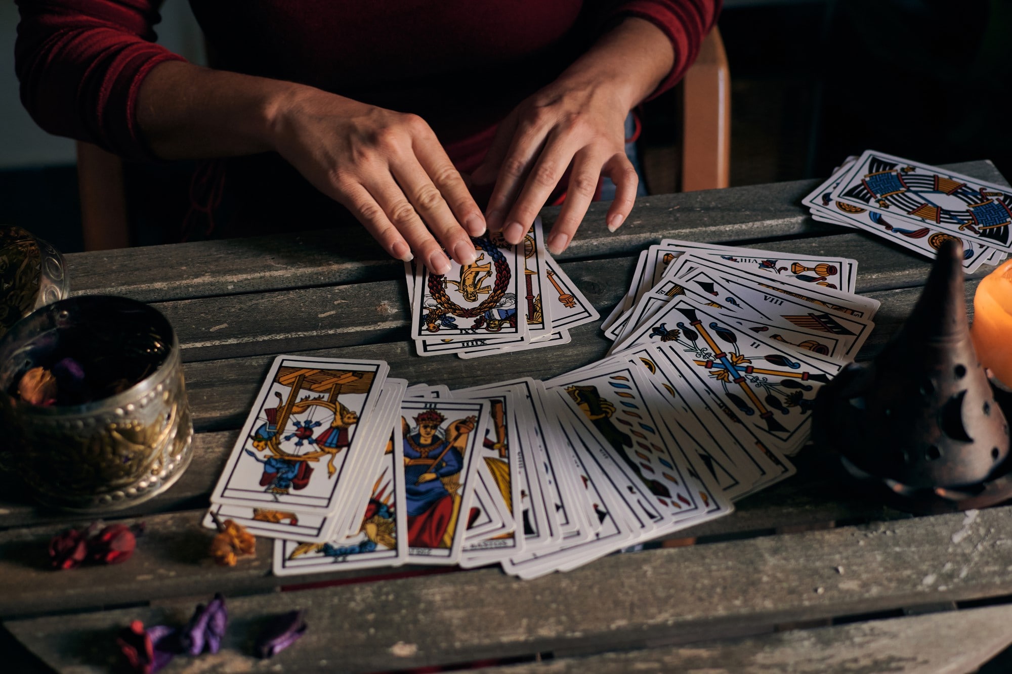 pythoness woman reading tarot cards on a wooden ta 2022 03 29 23 44 22 utc min