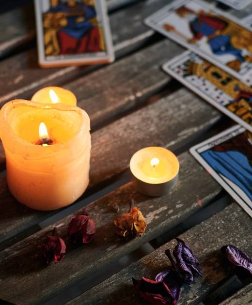 lighted-candles-on-a-wooden-table-filled-with-taro-2022-03-29-23-41-54-utc-min Tarot Cards About Love